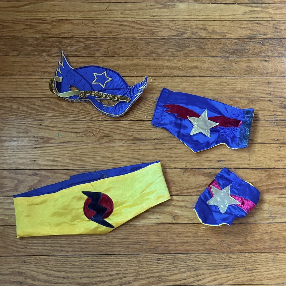 Reversible superhero mask arm bands and belt